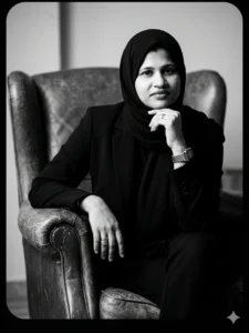 fabeena sitting in a chair full of confidence
